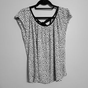 White and black floral blouse. Size Medium.